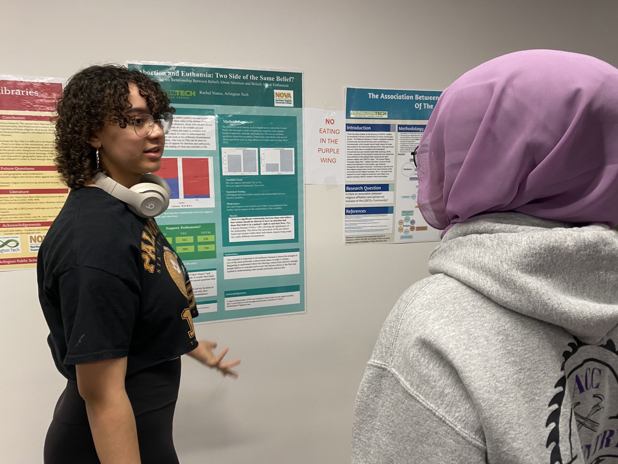 DE Statistics student practices her presentation before attending the Poster Session at NVCC Alexandria campus