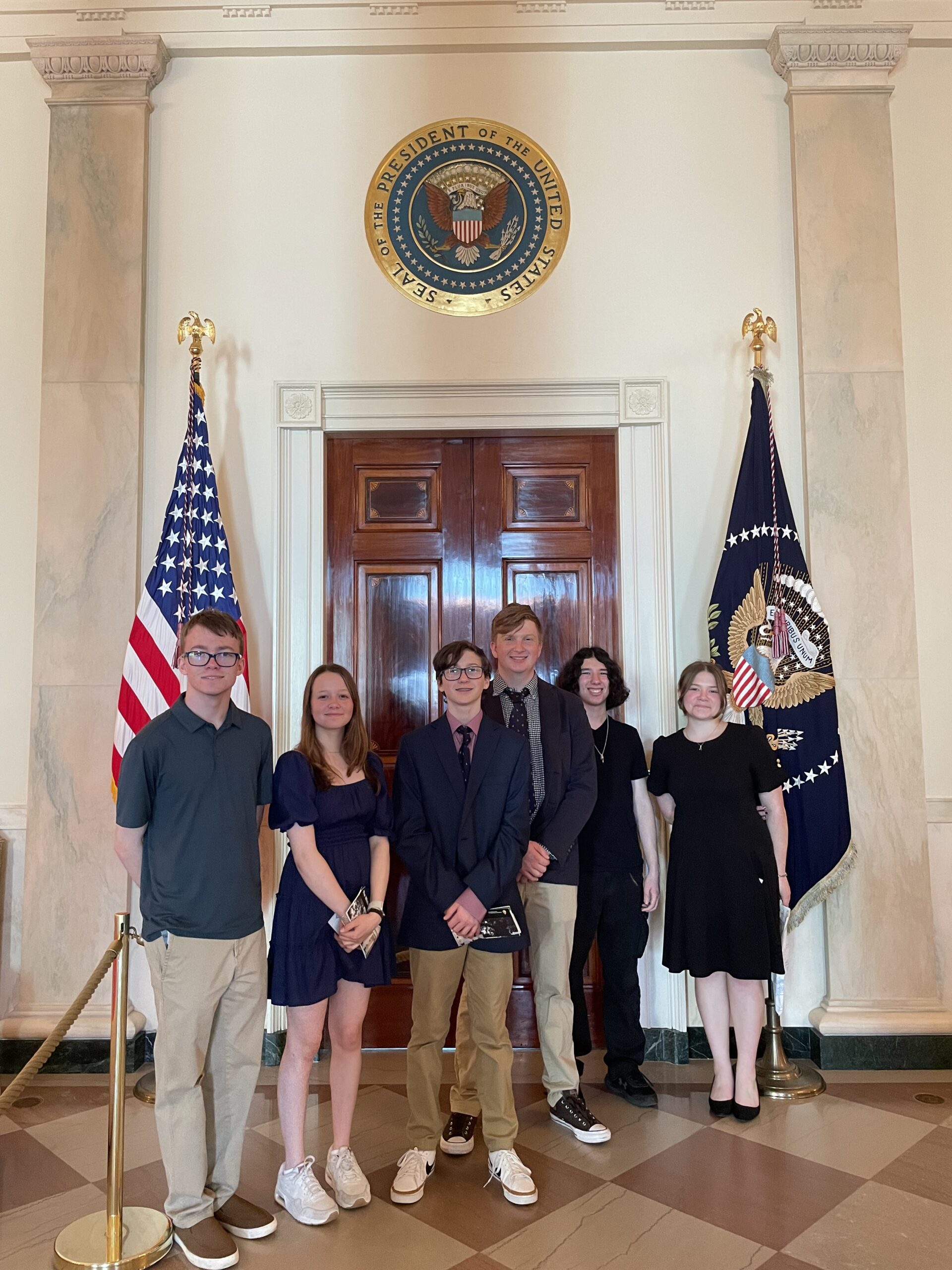 Picture of the members of the Band of Brats club at the White House