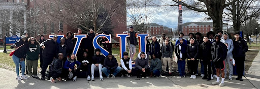 Picture of students standing in front of VSU signage in 2023-24.